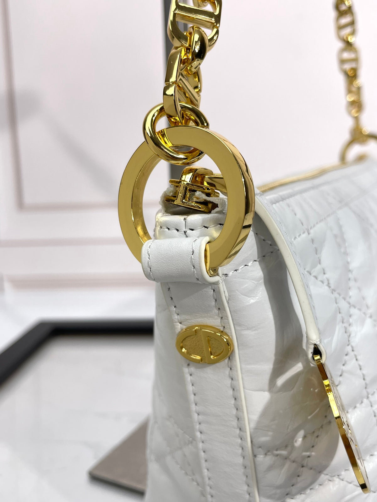 Elegant White Quilted Shoulder Bag with Gold-Tone Chain Strap