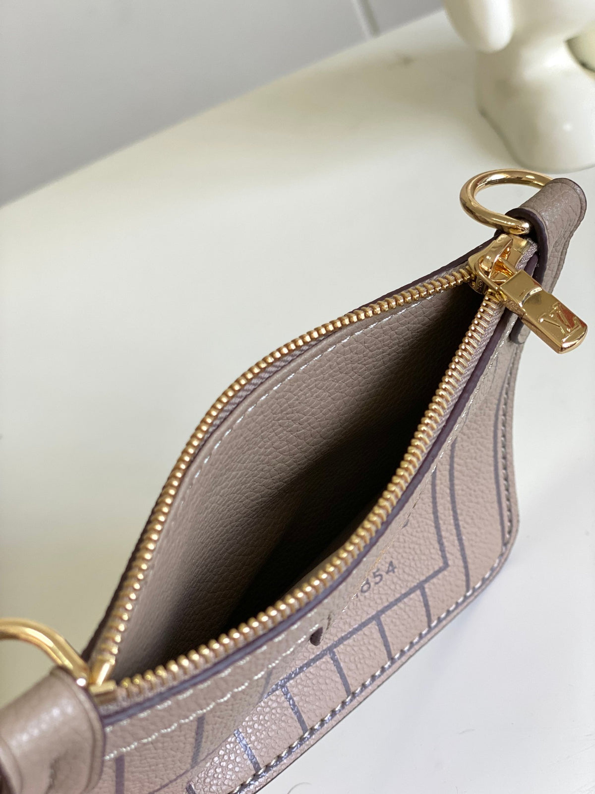 Louis Vuitton Classic Taupe Leather Bucket Bag with Top Handle and Strap