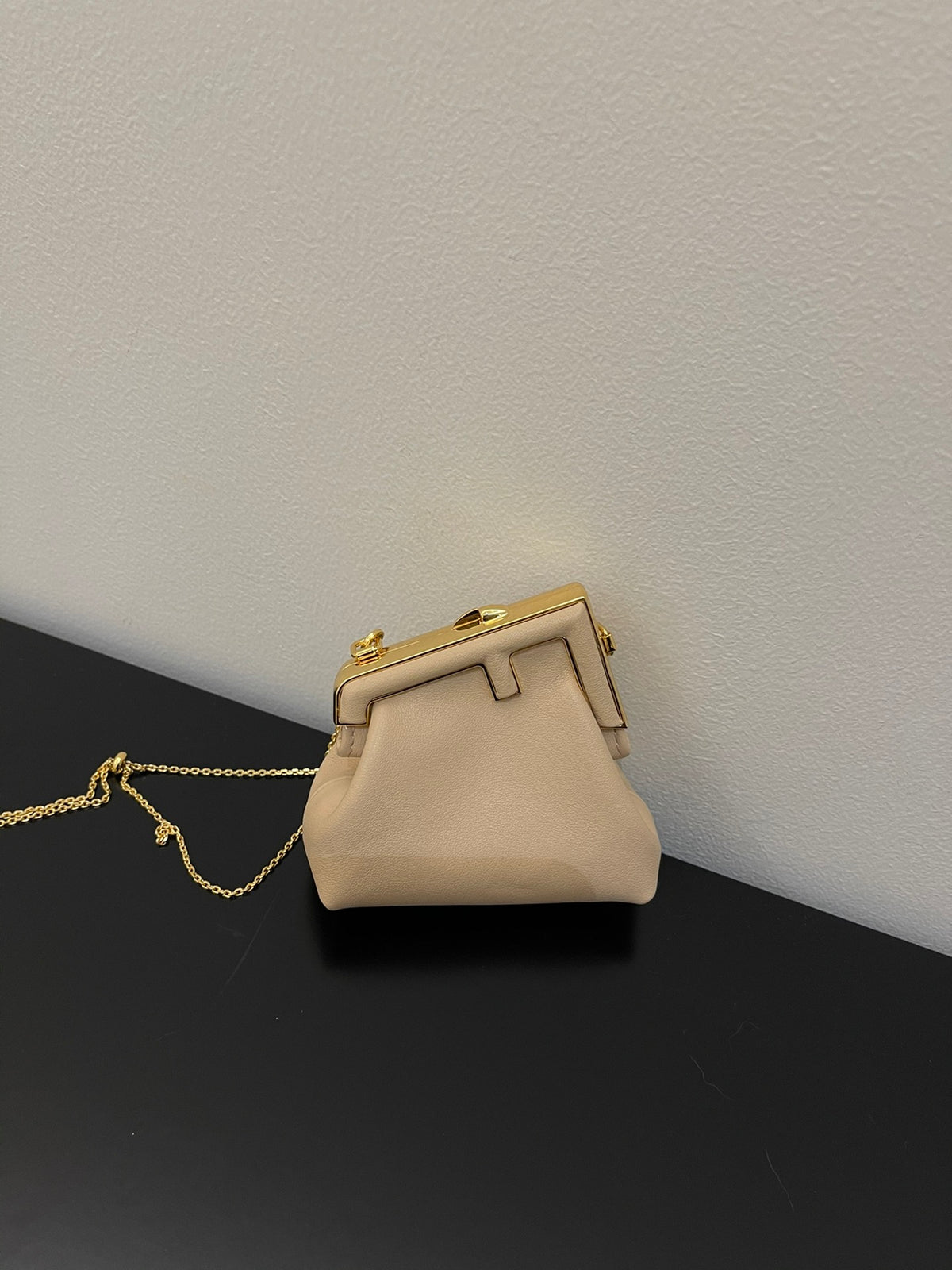 Nano Beige Leather Pouch with Gold Chain Strap and Metal Frame Closure