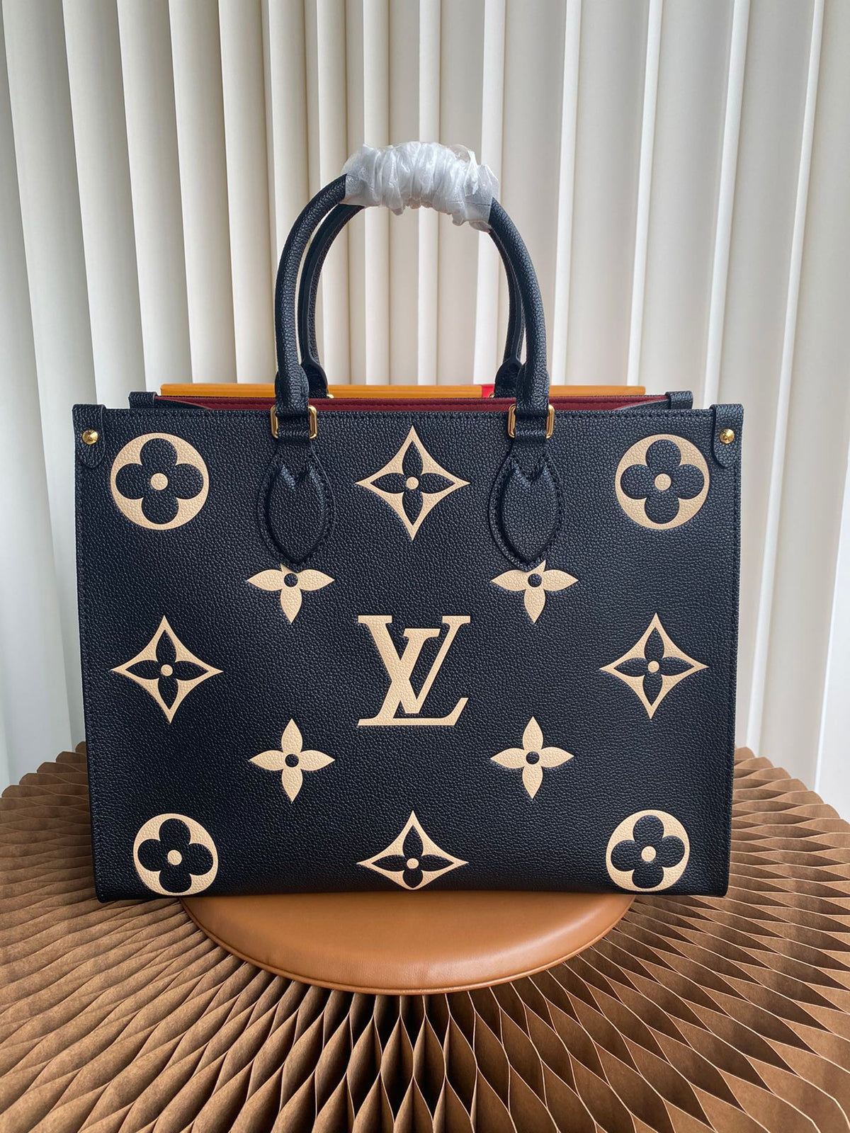 Louis Vuitton Luxury Black Leather Tote Bag with Gold Monogram Pattern