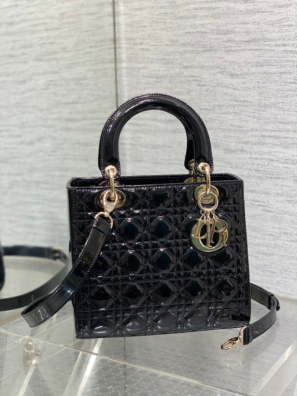Dior Elegant Black Quilted Patent Leather Mini Handbag with Gold Hardware