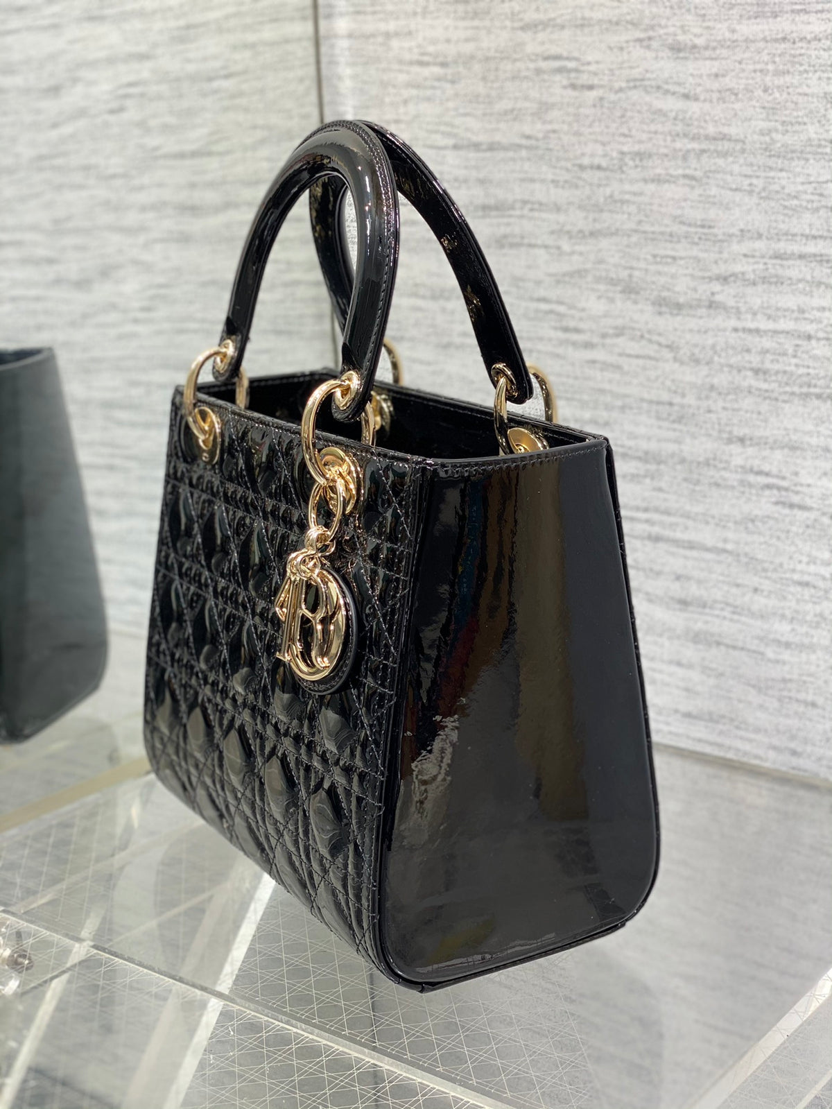 Dior Elegant Black Quilted Patent Leather Mini Handbag with Gold Hardware