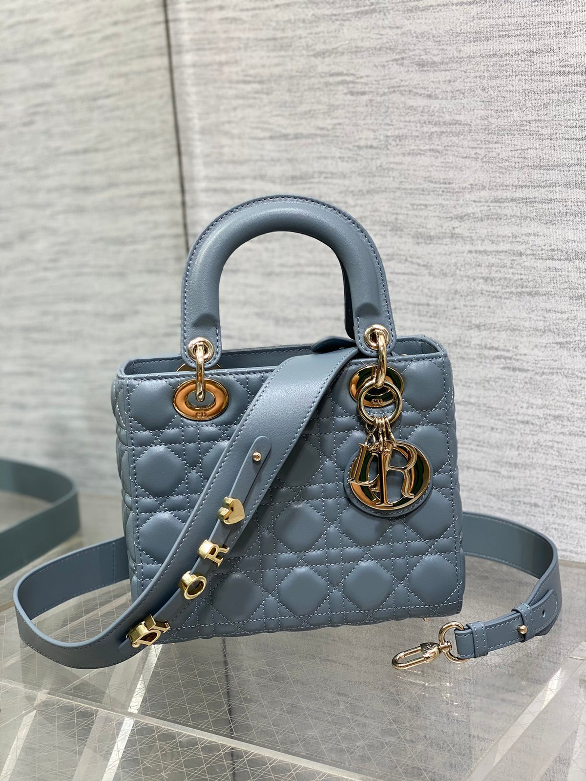 Dior Elegant Dusty Blue Quilted Leather Handbag with Shoulder Strap