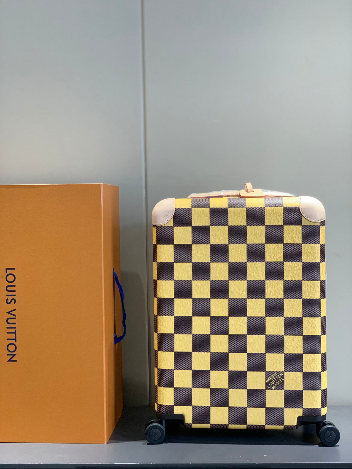 Checkerboard Pattern Rolling Suitcase with Leather Wrapped Handle