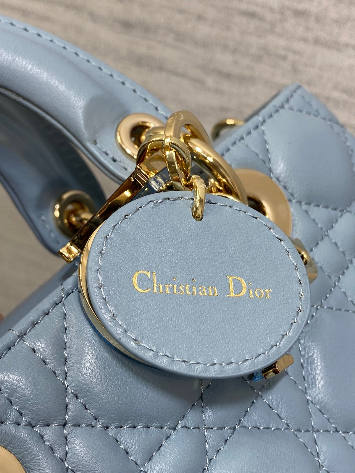 Dior Elegant Light Blue Quilted Leather Crossbody Bag with Top Handle