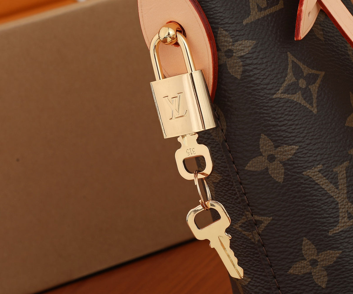 Louis Vuitton Alma BB Monogram Canvas Handbag