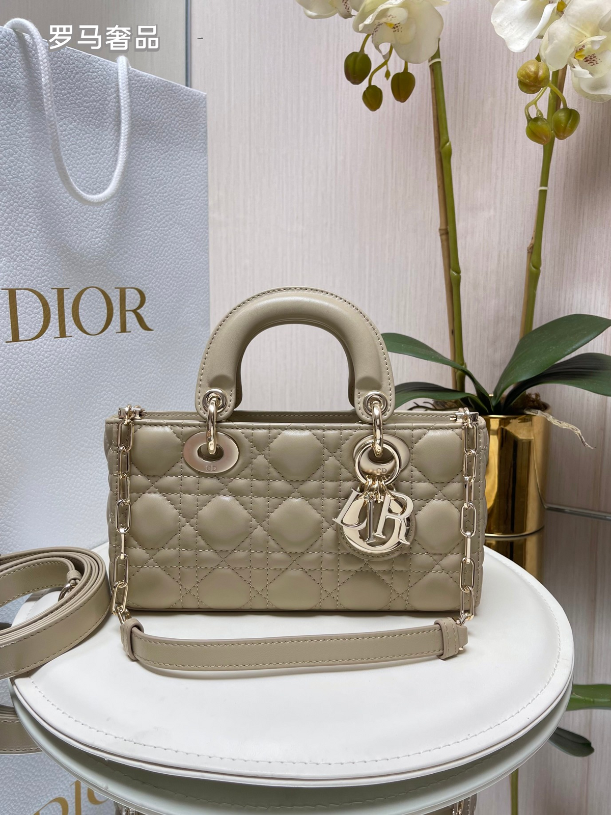 Dior Black Quilted Leather Handbag with Top Handle and Gold Chain Strap